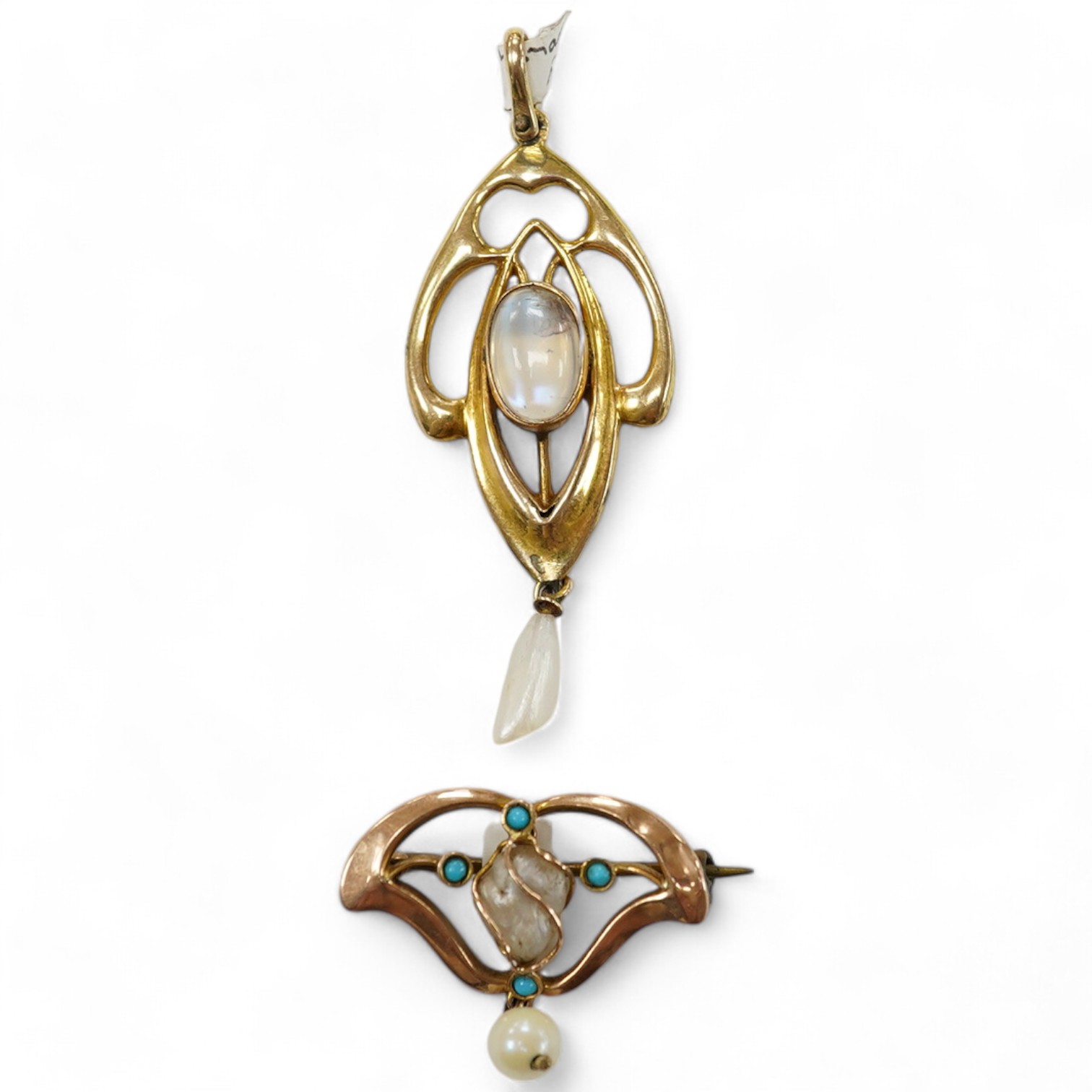 An Edwardian Art Nouveau 9ct gold, cabochon moonstone and baroque pearl drop set pendant, 56mm, together with a similar 9ct gold, baroque pearl and turquoise set drop brooch, 26mm, gross weight 4.5 grams. Condition - fai